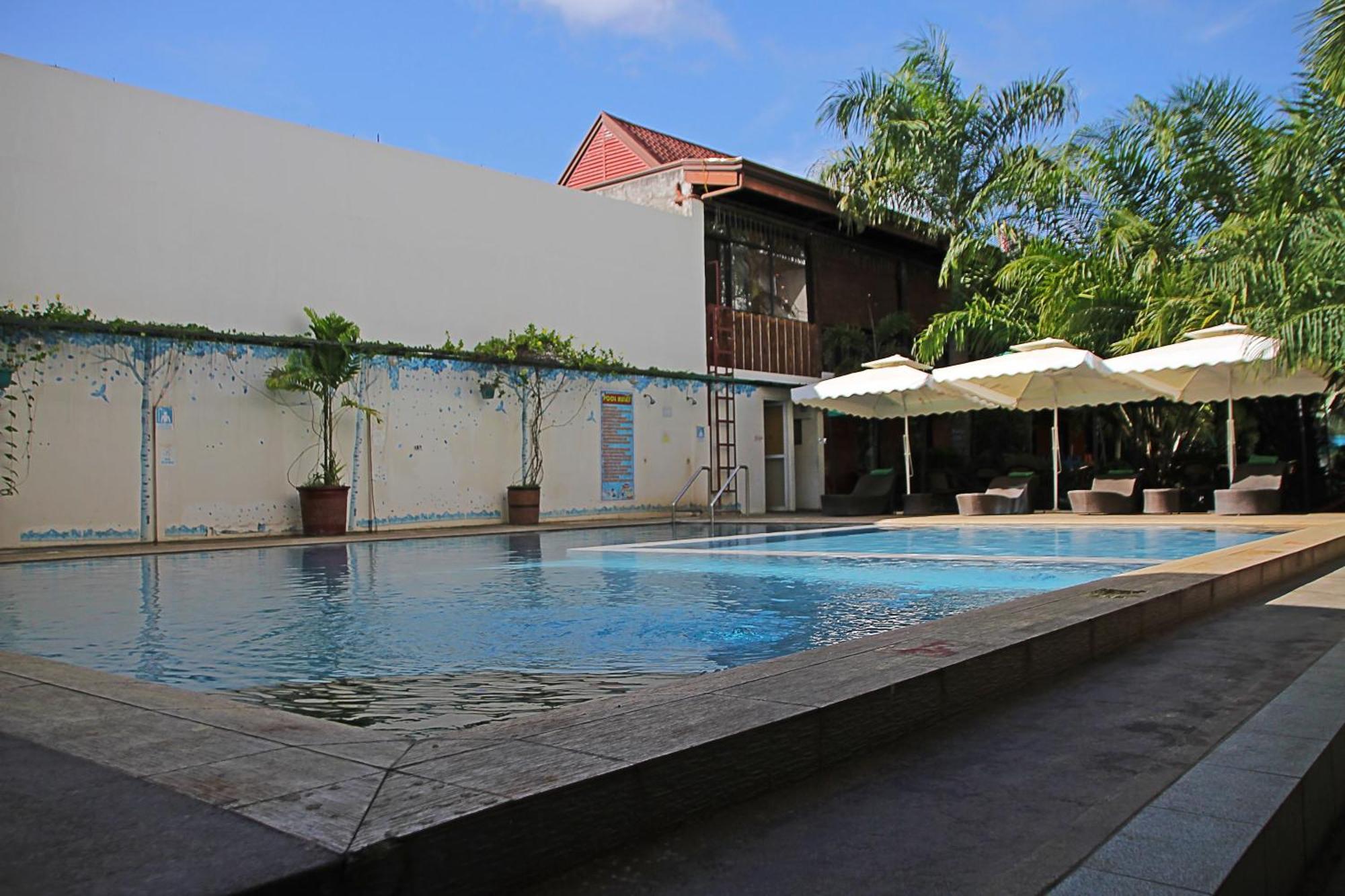 Palawan Uno Hotel Puerto Princesa Exterior photo